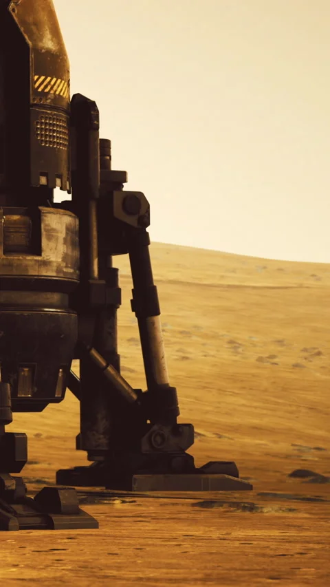 Futuristic robot exploring the rugged landscape of an alien world at sunset Stock Footage 331839277