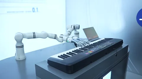 Futuristic robotic arm with an artificial hand playing a melody on a synthesizer Stock Footage 328988392