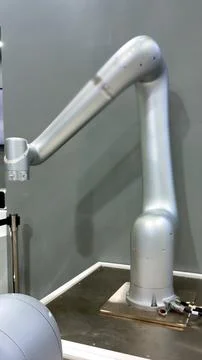 Futuristic robotic arm presented at tech expo highlights precision engineering Stock Photos