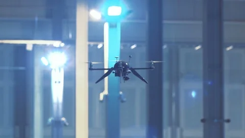 Futuristic sci-fi delivery drone flies inside giant warehouse v6 Stock Footage 106711453