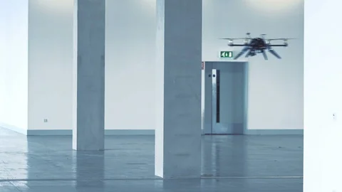 Futuristic sci-fi drone flies and scans office building interior Stock Footage 106393066