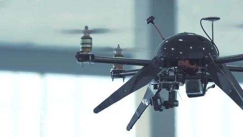 Futuristic sci-fi drone flies and scans office building interior CU Stock Footage 106393074