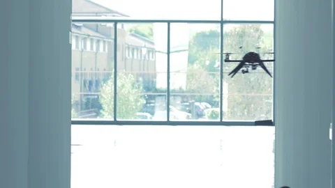Futuristic sci-fi drone flies and scans office building interior MS Stock Footage 106393083