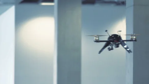 Futuristic sci-fi drone flies and scans office building interior CU 2 Stock Footage 106393129