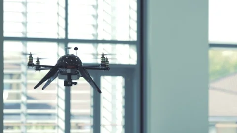 Futuristic sci-fi drone flies and scans office building interior CU 5 Stock Footage 106393295