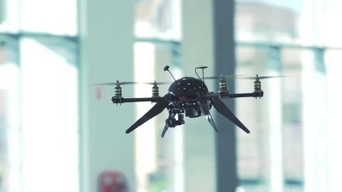 Futuristic sci-fi drone flies and scans office building interior CU 6 Stock Footage 106393304