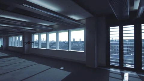 Futuristic sci-fi drone flies inside in front of window with London view WIDE Stock Footage 106396510
