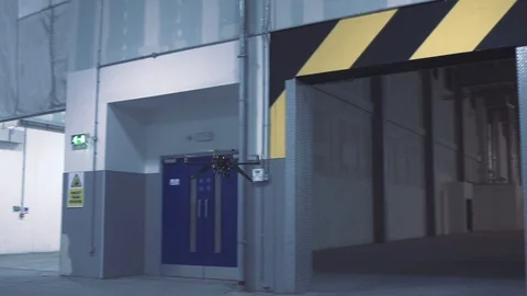 Futuristic sci-fi drone flies through warehouse loading bay Stock Footage 106710758