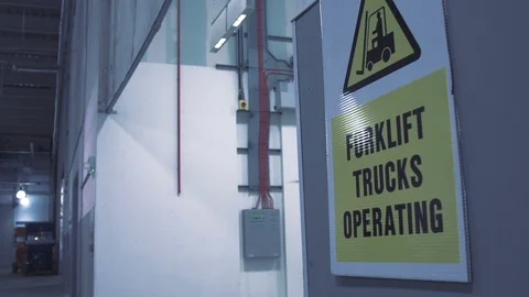 Futuristic sci-fi drone flies past while inspecting warehouse Stock Footage 106710837