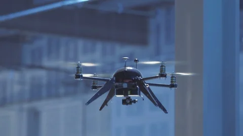 Futuristic sci-fi drone flies high in industrial warehouse CU Stock Footage 106711598