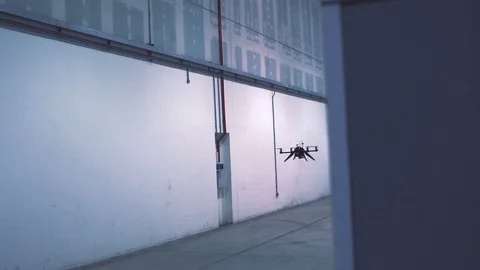 Futuristic sci-fi drone reveal while inspecting warehouse v2 Stock Footage 106711243