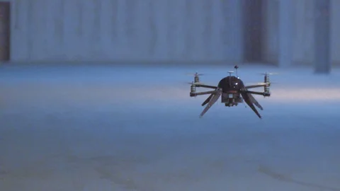 Futuristic sci-fi drone super slow-motion inside industrial building Stock Footage 106712297