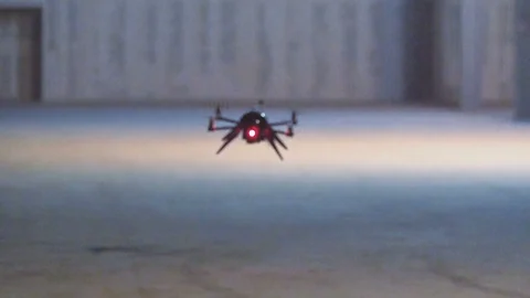 Futuristic sci-fi drone super slow-motion inside industrial building v2 Stock Footage 106712310
