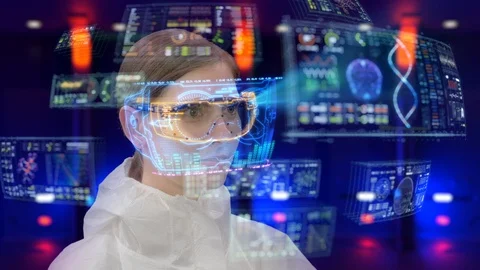 Futuristic scientist uses augmented reality headset to access critical data Video stock 99325793