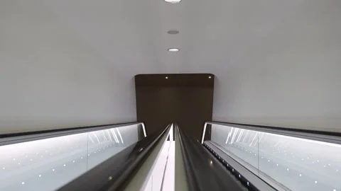 Futuristic shot of escalator in tunnel going up. Stock Footage 259040960