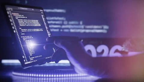 Futuristic software development concept. Programmer hand using digital pen on Stock-Fotos