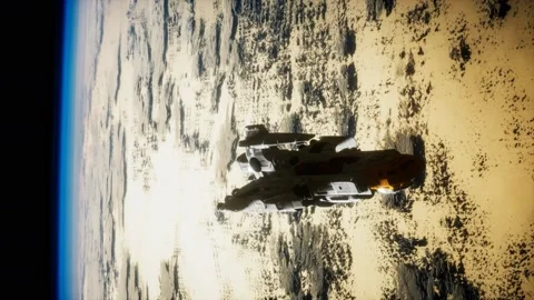 Futuristic spaceship near the Earth. Elements of this image furnished by NASA Stock Footage 138084463