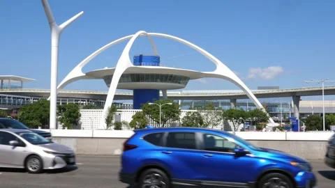 Futuristic structure called the Theme Building at LAX airport. Los Angeles, USA. Stock Footage 261586452