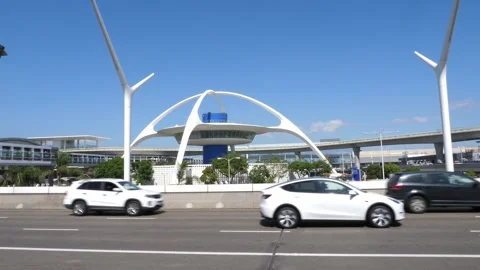 Futuristic structure called the Theme Building at LAX airport. Los Angeles, USA. Stock Footage 261586456