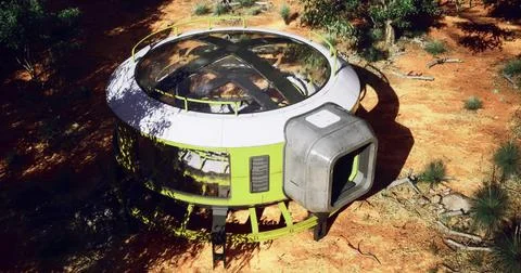 Futuristic structure in a desert landscape surrounded by trees Ilustración de archivo