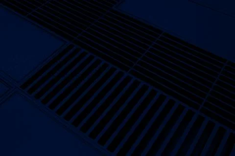 Futuristic technological or industrial background made from metal grates an.. Ilustración de archivo