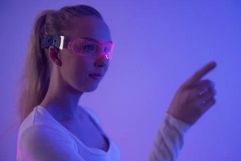 Futuristic Technology User in Neon Light Stock Photos