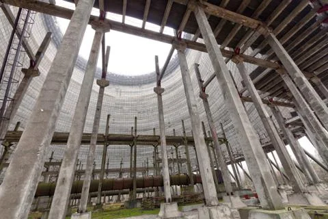 Futuristic view inside of cooling tower of unfinished Chernobyl nuclear power Stock Photos
