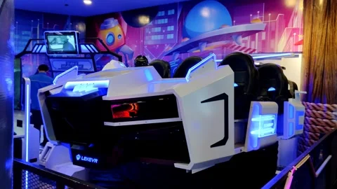 Futuristic Virtual Reality Motion Ride in an Entertainment Facility Stock Footage 305394983