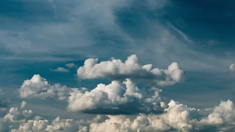 Futuristic white big clouds fast moving in dark ble sky. Stock Footage 123340991