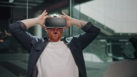 Futuristic Workflow. Man Uses 3D Augmented Reality Glasses in Modern Office Video stock 307027709