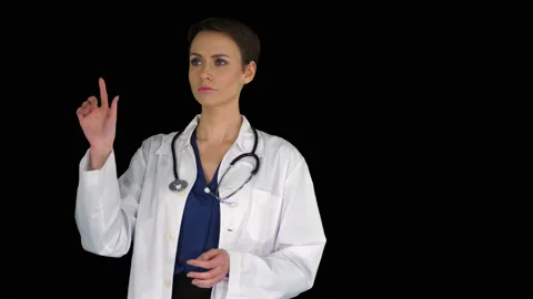 A futuristic young pharmacist uses virtual screen, Alpha Channel Stock Footage 133246920