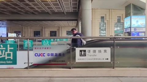 A Fuxing bullet train leaving Jinan West Railway Station in China Stock Footage 293667034