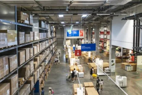 Fuzzy top view facing downward picking the warehouse area to purchase furni.. Stock Photos