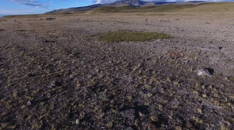 Fying over Flood Plain to North in Cotapaxi Park Stock Footage 66385048