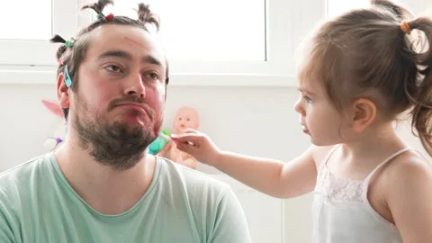 Fynny Dad Chronicles When Putting Makeup on His Kid Becomes a Comedy Sketch Stock Footage 278388312