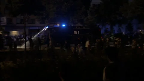 G20 Summit 2017: Moving Water Cannon Vehicle Amid Night Protest in Hamburg_4K Stock Footage 315389201