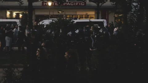 G20 Summit 2017: Night Crowds of Demonstrators and Police Group in Hamburg_4K 動画素材 315396985