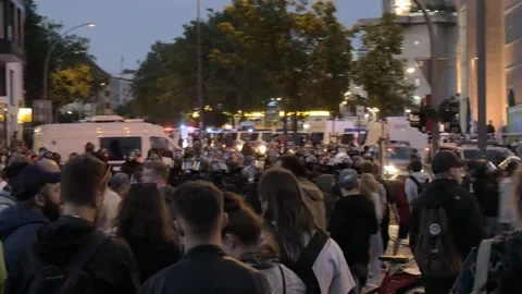 G20 Summit 2017: Night Crowds of Demonstrators and Police in Hamburg_4K Stock Footage 315397021