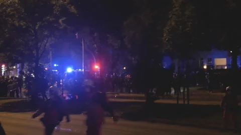 G20 Summit 2017: Night Demonstrators and Police, Crowds Running in Hamburg 4K Stock Footage 315396471