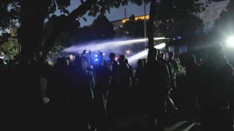 G20 Summit 2017: Night Protester Throwing Objects at Police in Hamburg_4K Stock Footage 315398357