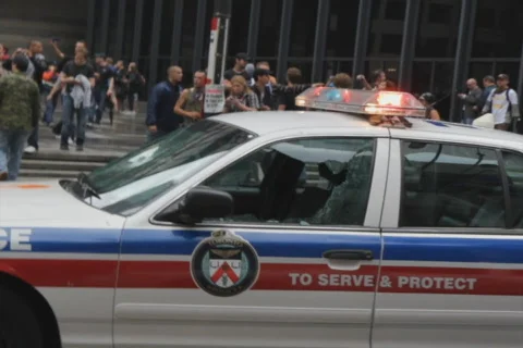G20 Toronto. Smashed police car. SD. Stock Footage