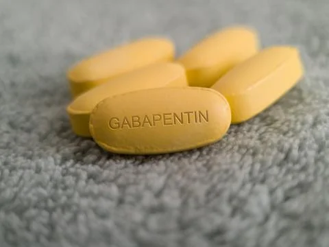 Gabapentin yellow tablet Stock Photos
