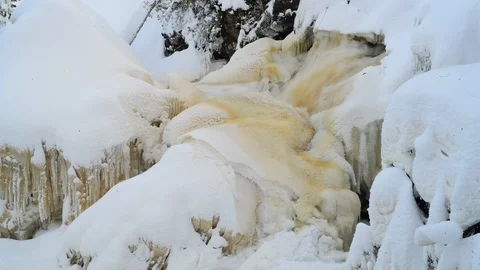 Gabbro Upper Falls Winter snow, flowing water ice Michigan's Upper Penn. Stock Footage 123379593