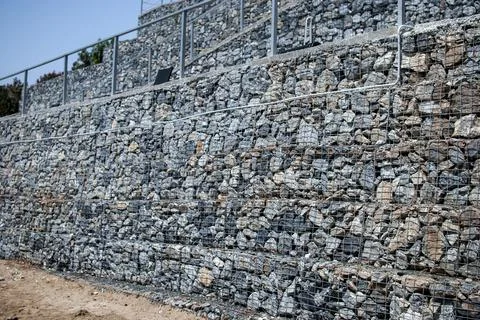 Gabion wall closeup Stock Photos