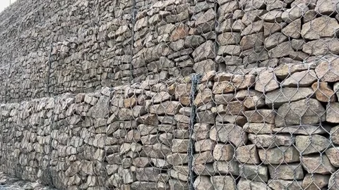 Gabion wall constructed using steel wire mesh basket Stock Footage 162018307