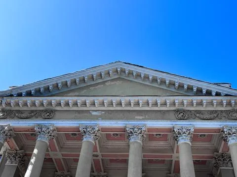 The gable triangular roof of a large building. 写真素材