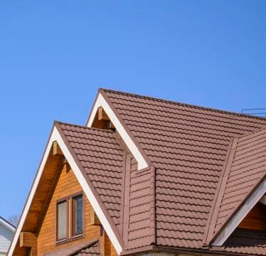 Gable triangular roof with a large pediment 스톡 사진