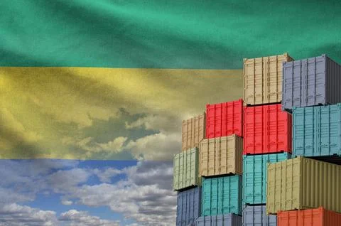 Gabon flag and big stack of shipping cargo containers in docks with sky イラスト素材