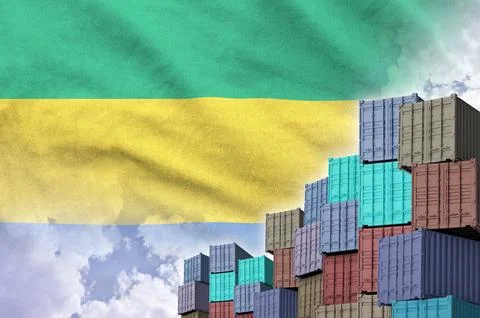 Gabon flag and big stack of shipping cargo containers in docks with sky Stock Illustration