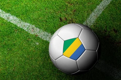 Gabon flag pattern of a soccer ball in green grass Stock Illustration
